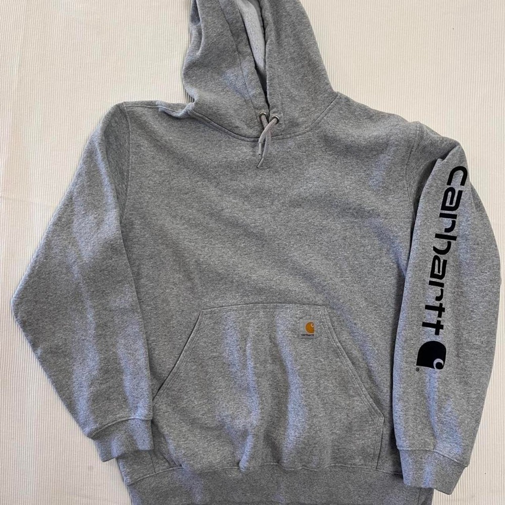 Carhartt hoodie with black logo on sleeve size Large loose fit. Mid 2000
